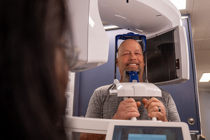 Patient taking a dental x-ray
