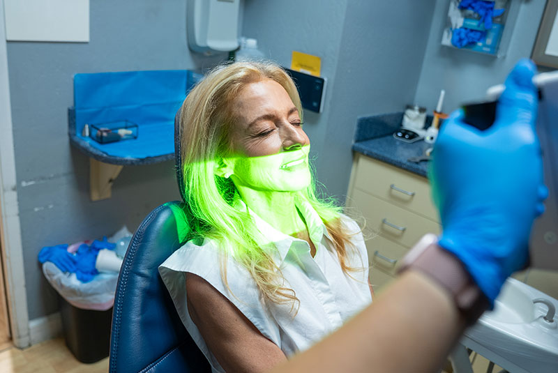 Team member taking a 3d scan of Patients Face