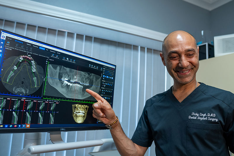 Doctor Pointing at dental X-ray